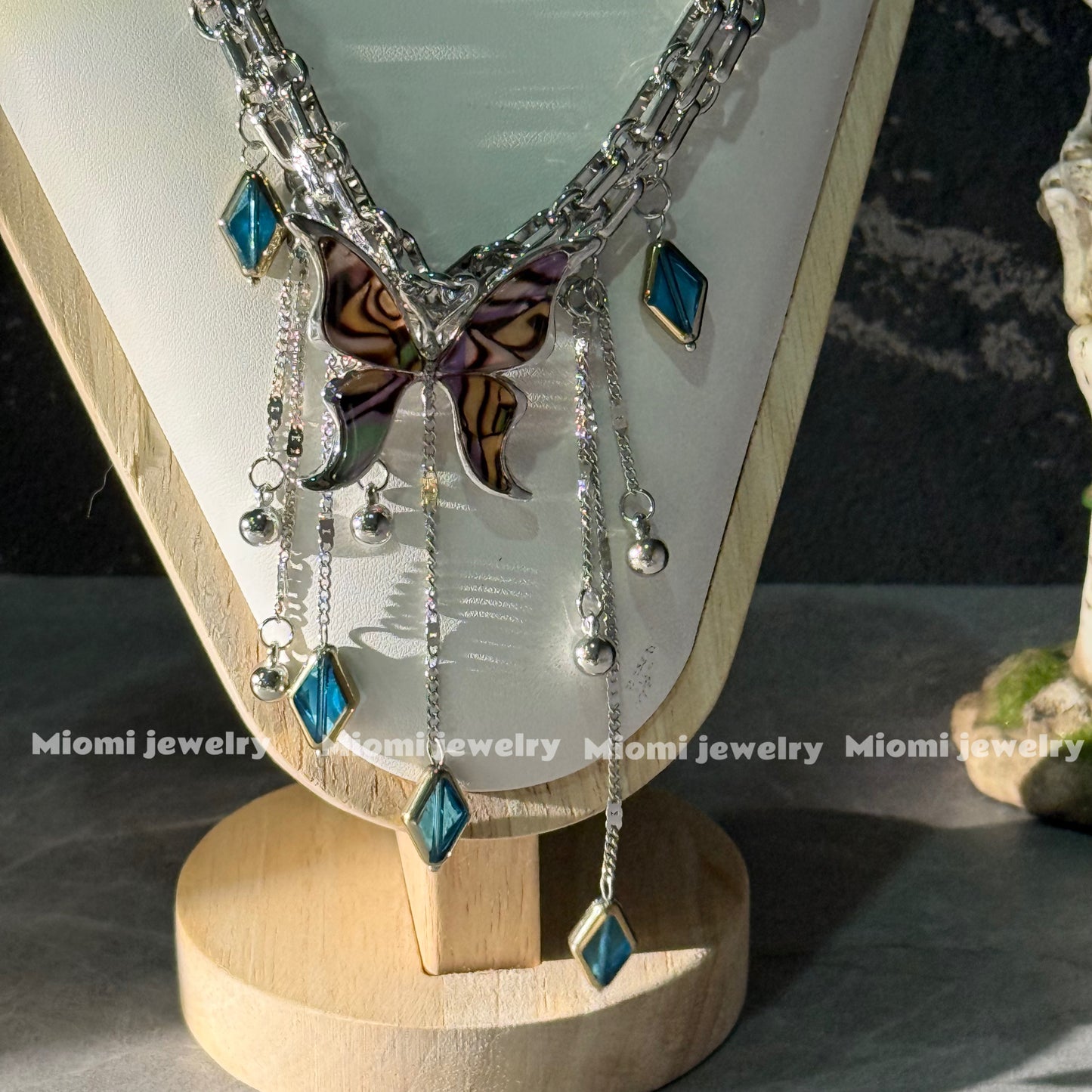 gothic whimsical siver necklace with butterfly