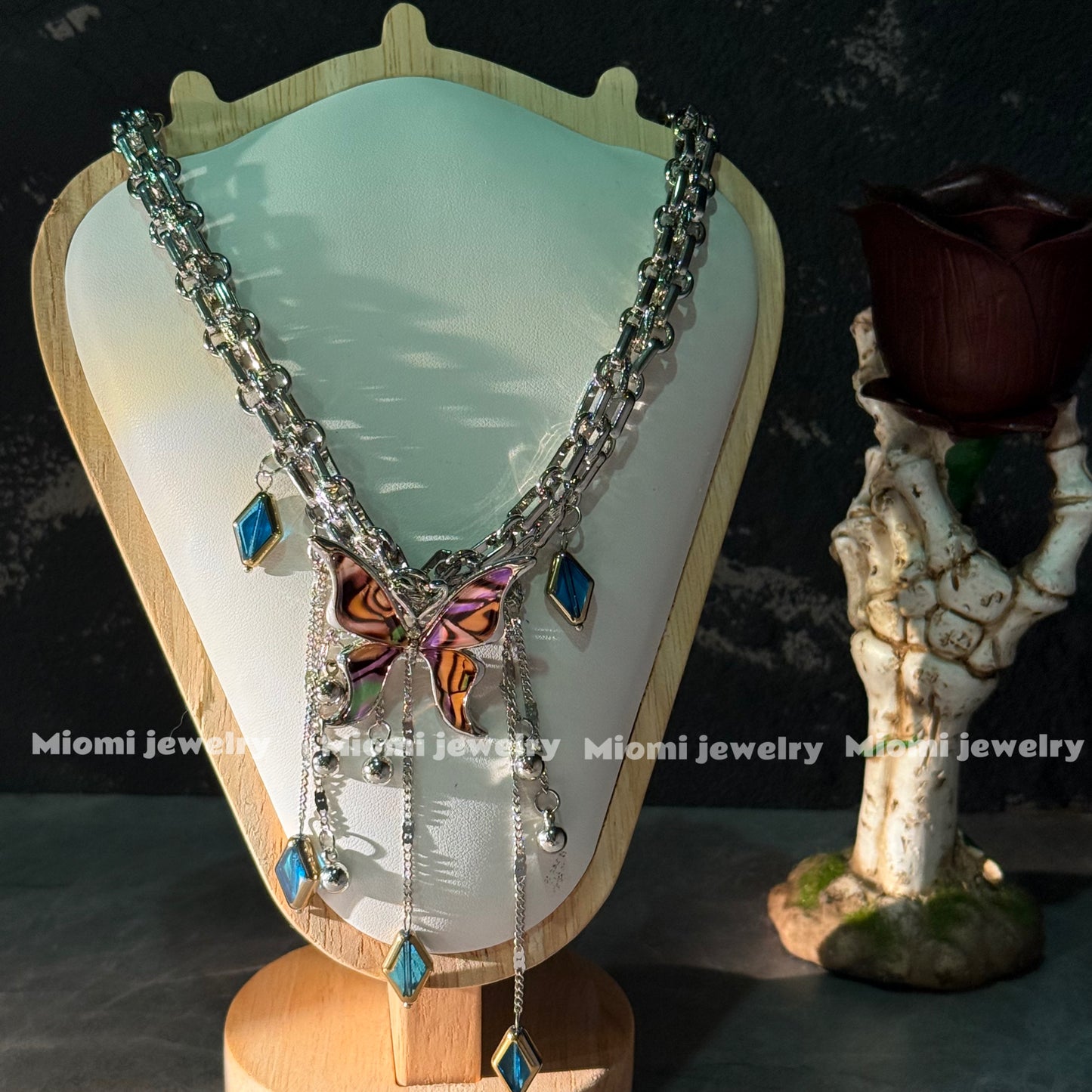 gothic whimsical siver necklace with butterfly