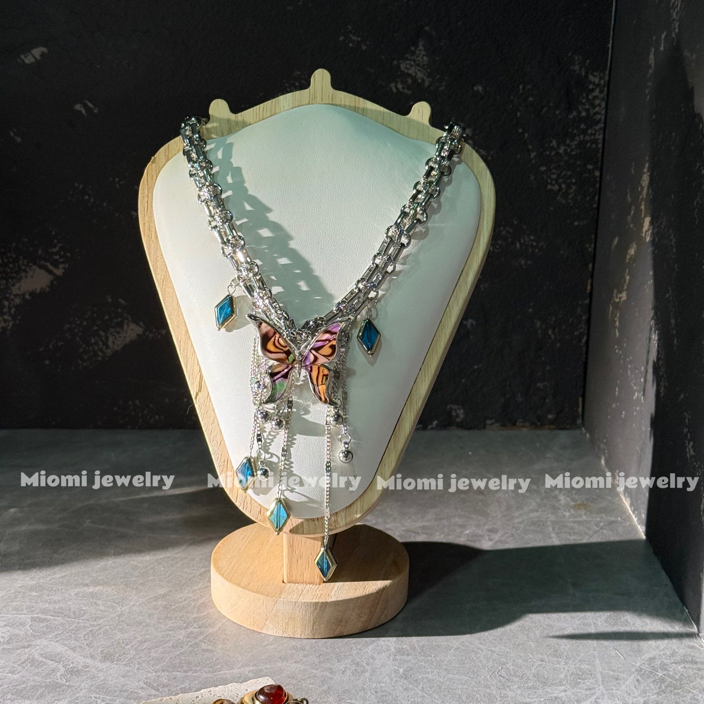 gothic whimsical siver necklace with butterfly