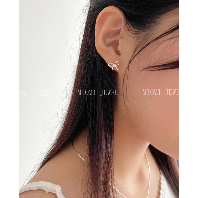 Weekend Korean Jewelry 925 Sterling Silver Earrings Wind Bowknot Hollow Simple Design Sense Niche Design