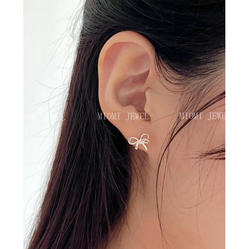 Weekend Korean Jewelry 925 Sterling Silver Earrings Wind Bowknot Hollow Simple Design Sense Niche Design