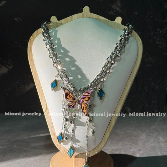 gothic whimsical siver necklace with butterfly