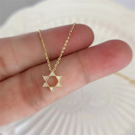 S925 Sterling Silver Six - Pointed Star Necklace for Women. The pendant features a hollow - out design, is plated with 14K gold, and inlaid with diamonds.