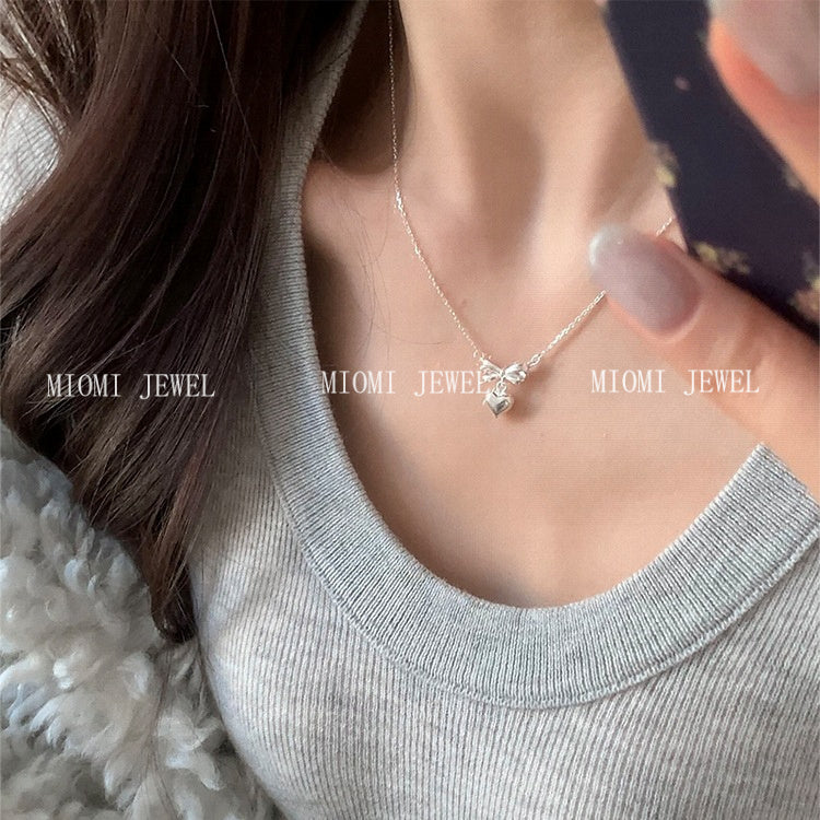 S925 Sterling Silver Niche Design Bowknot Heart Pendant Necklace for Women